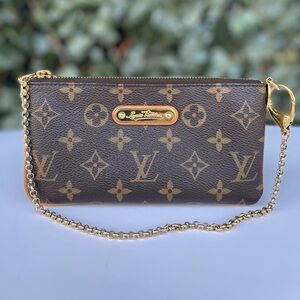 Louis Vuitton Milla clutch
